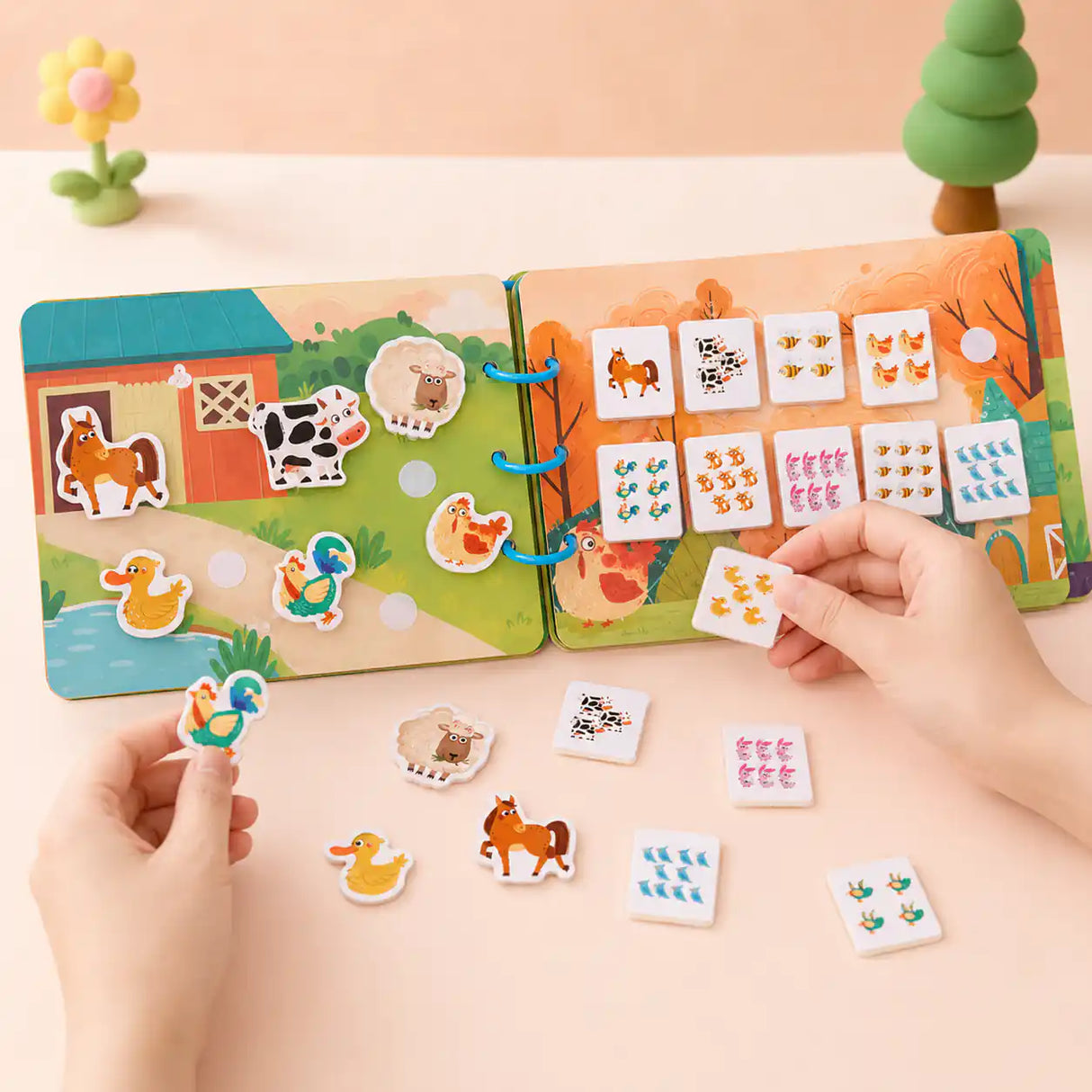 Detail of the Montessori busy book cover and bound spine showing fabric and stitching