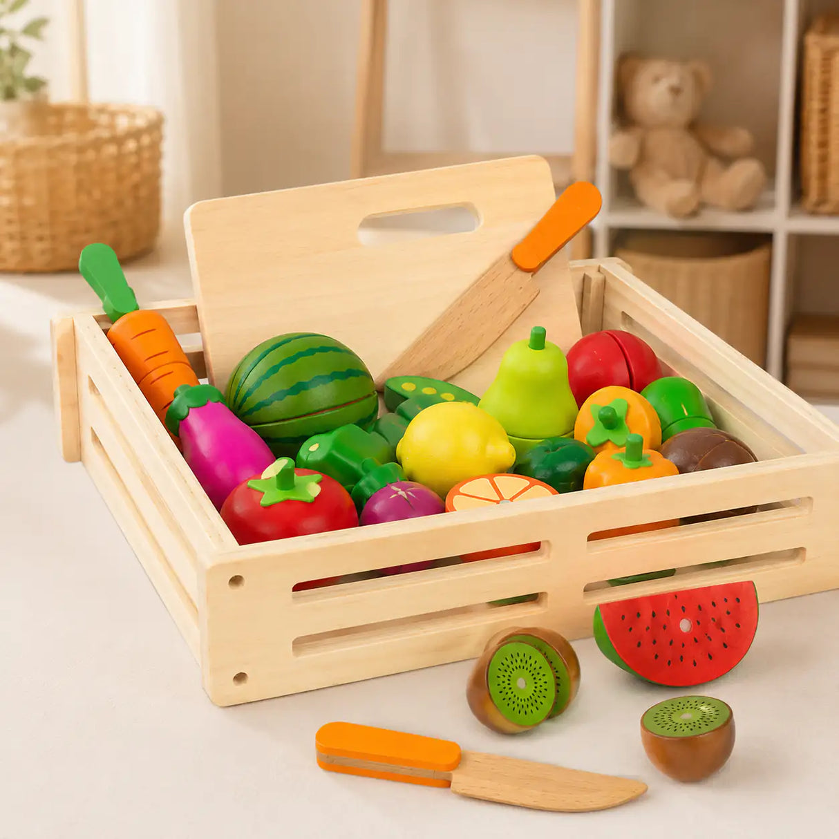 Wooden cutting fruits and vegetables play set with 17 pieces and wooden crate on a cream background