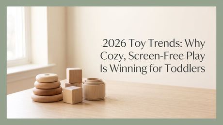 Blog cover reading '2026 Toy Trends: Why Cozy, Screen-Free Play Is Winning for Toddlers' over a warm Montessori nursery scene with natural wooden toddler toys