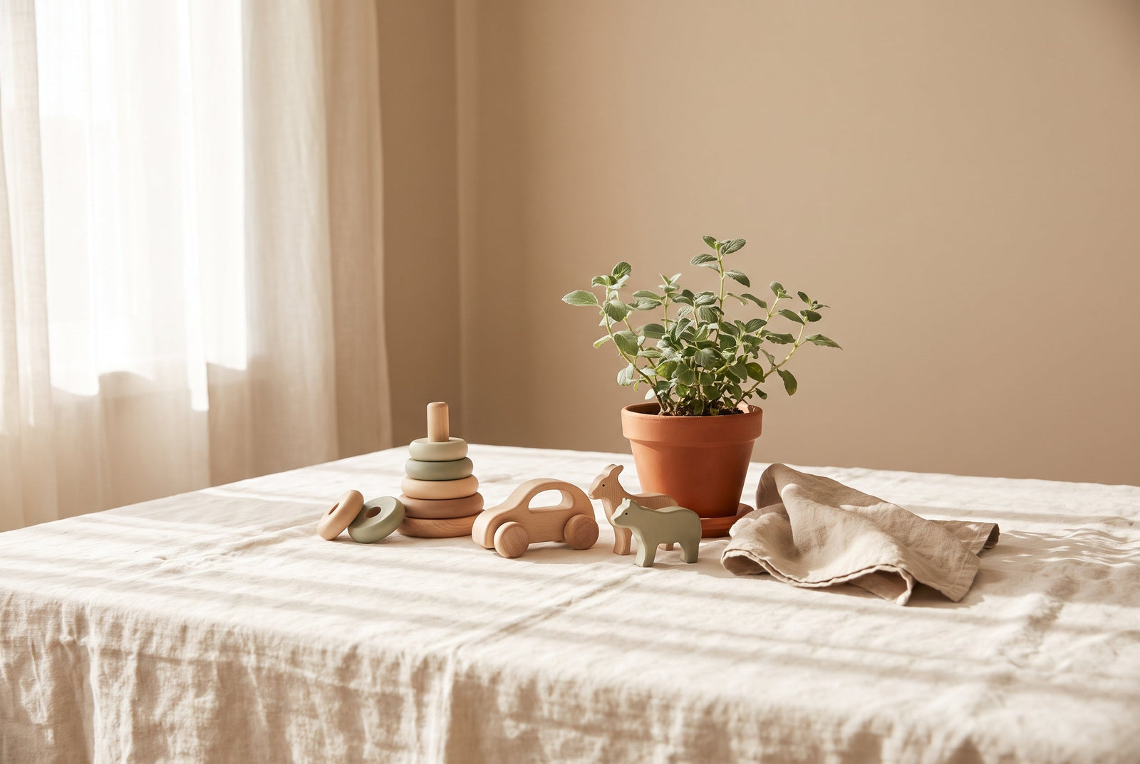 Natural wooden toddler toys arranged on cream linen beside raw wood and eco-friendly materials, illustrating safe natural toy materials