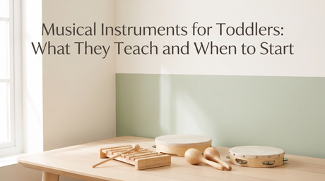 Wooden toddler musical instruments including xylophone, hand drum, maracas and tambourine arranged on a cream background