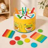 Rainbow wooden discs included in the dinosaur color sorting drum set