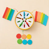 Close-up of colorful wooden dowels for the dinosaur sorting drum