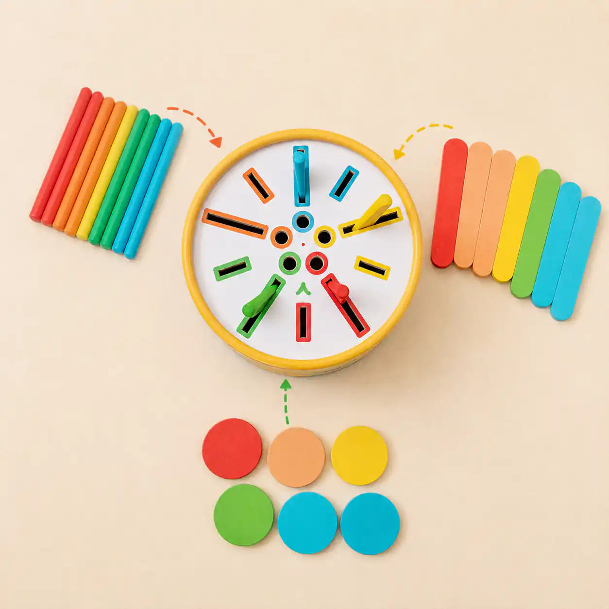 Close-up of colorful wooden dowels for the dinosaur sorting drum
