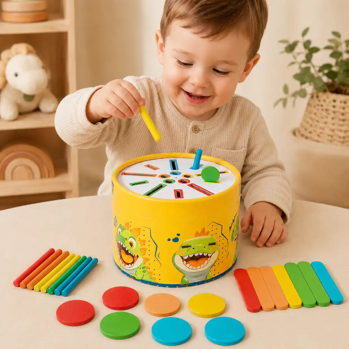 Dinosaur sorting drum styled in a Montessori-inspired playroom setting