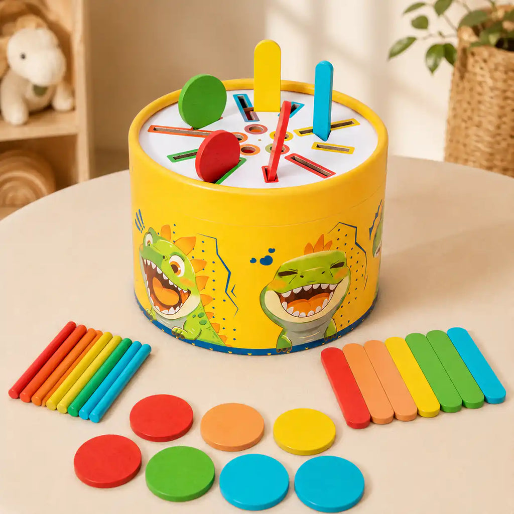 Wooden dinosaur color sorting drum top view with rainbow sorting pieces