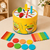 Wooden dinosaur color sorting drum top view with rainbow sorting pieces
