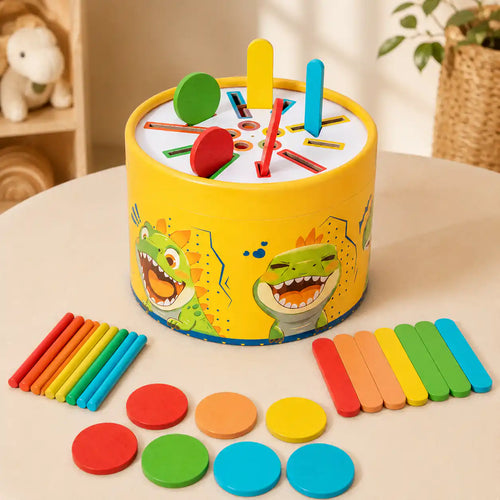 Wooden dinosaur color sorting drum top view with rainbow sorting pieces