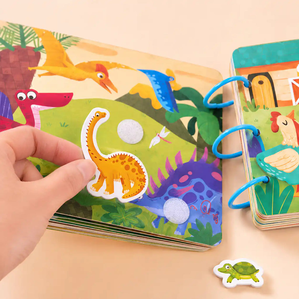 All activity pages of the Montessori busy book set laid out flat showing each themed scene