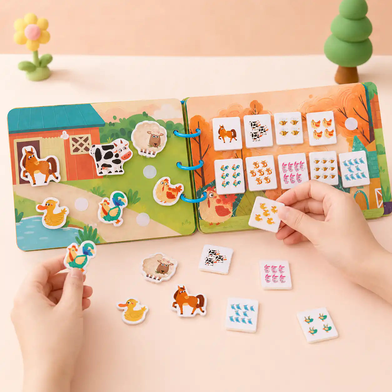 Detail of the Montessori busy book cover and bound spine showing fabric and stitching