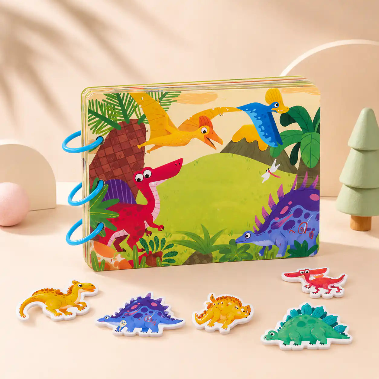 Montessori busy book set open showing multiple themed activity pages side by side