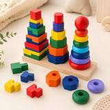 Side angle of the wooden 3-in-1 geometric stacker showing all three towers and loose stacking pieces in front of the base