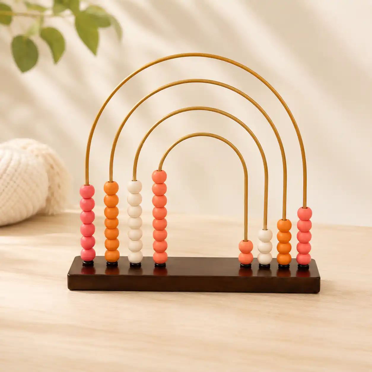 Size diagram for the wooden 4-in-1 learning bundle showing the dimensions of the abacus, xylophone, rainbow puzzle, and hexagon stacker in centimeters