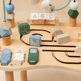Wooden Montessori table close-up of rotating ABC blocks for early alphabet recognition and fine motor play