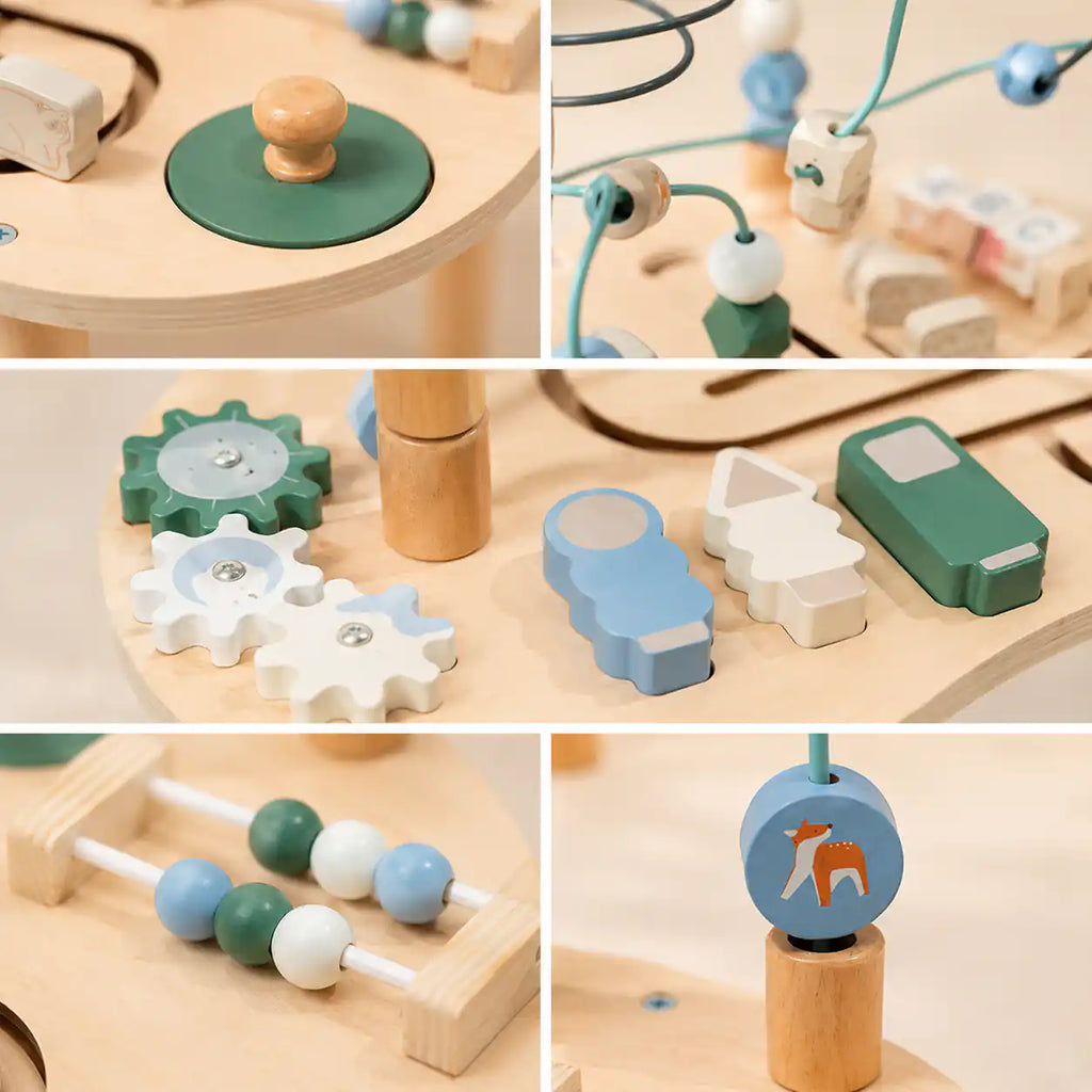Wooden activity table side panel featuring sliding bear and spinning fox disc for animal-themed pretend play