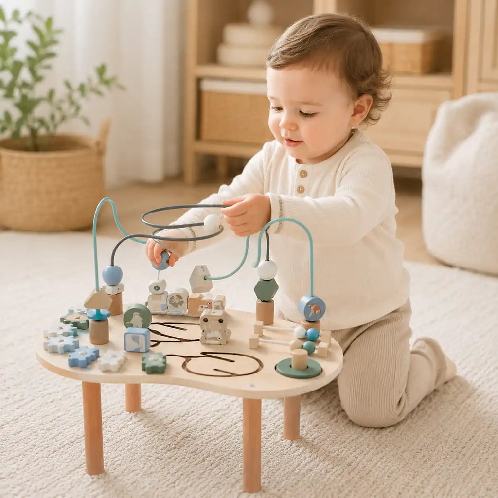Wooden Montessori activity table styled in a neutral nursery with soft natural light, ready for toddler play
