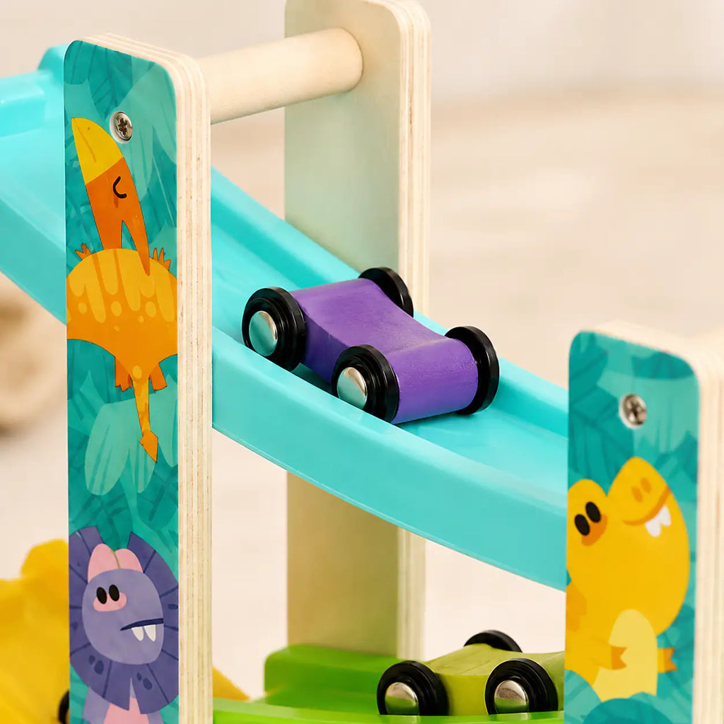 Sturdy wood frame and four colorful zigzag tracks of the dinosaur ramp racer shown together