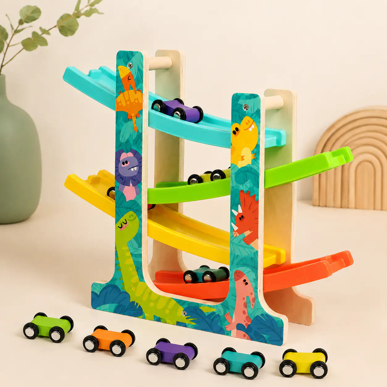 Wooden dinosaur ramp racer with four zigzag tracks and mini wooden cars on a cream background