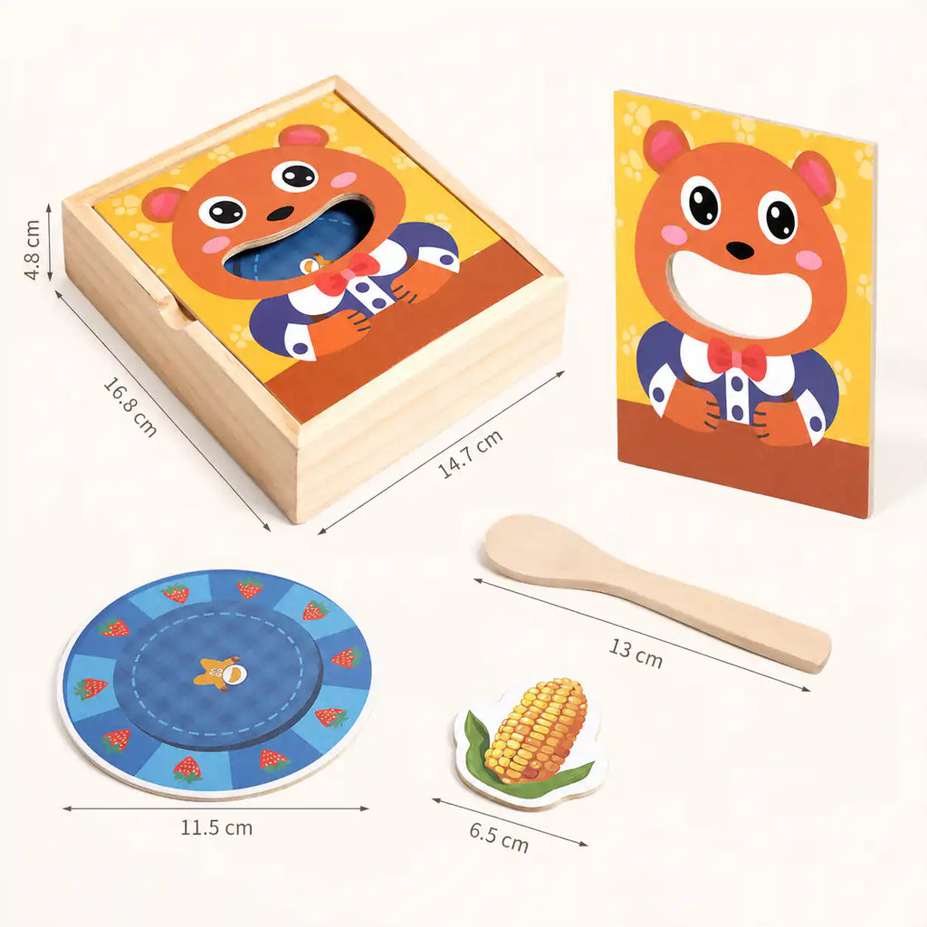 Wooden feed the bear toy showing dimensions of the storage box, bear face panel, wooden spoon, and strawberry-patterned plate for size reference