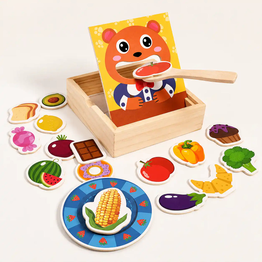Top-down view of the wooden feed the bear pretend play set with bear face panel in its storage box and assorted wooden food pieces arranged around it