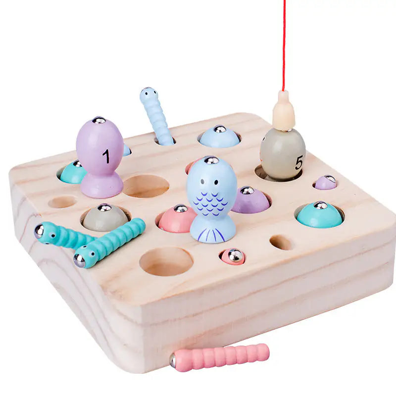 Empty natural wood game board of the wooden magnetic fishing game showing the fish holes