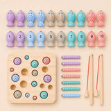 Flat lay of all ten numbered wooden fish from 1 to 10 from the magnetic fishing game