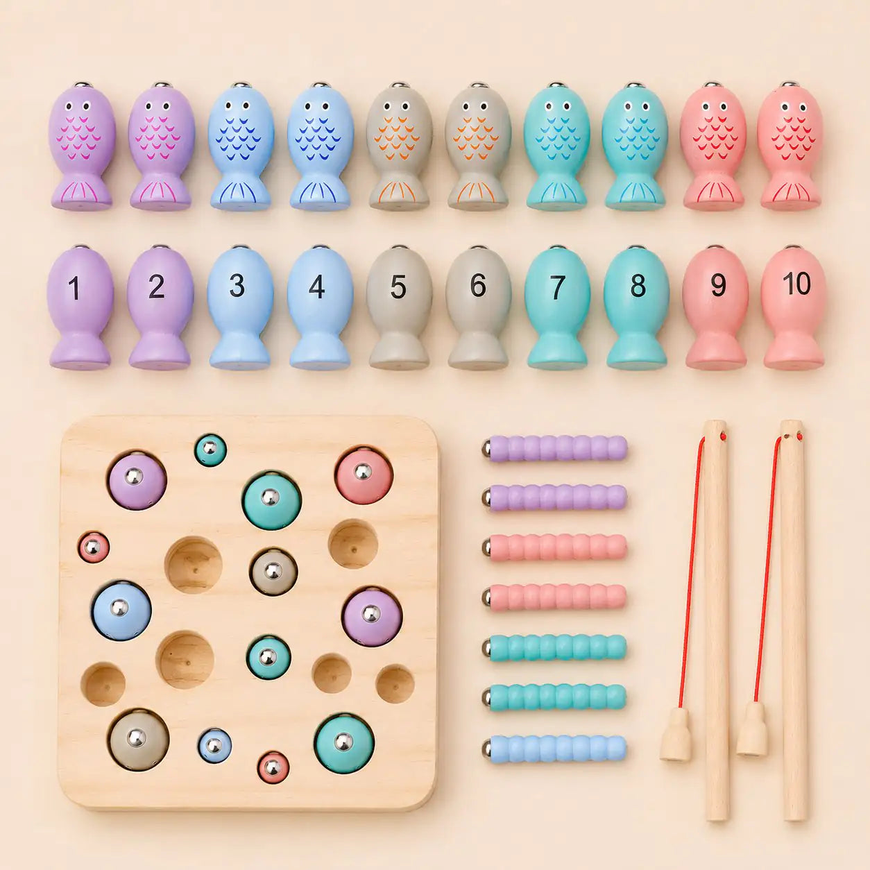 Flat lay of all ten numbered wooden fish from 1 to 10 from the magnetic fishing game