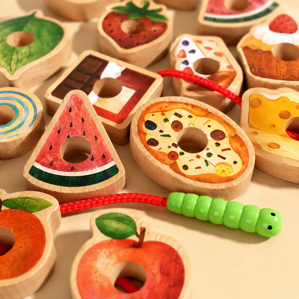 Caterpillar threading tip detail of the wooden food lacing toy