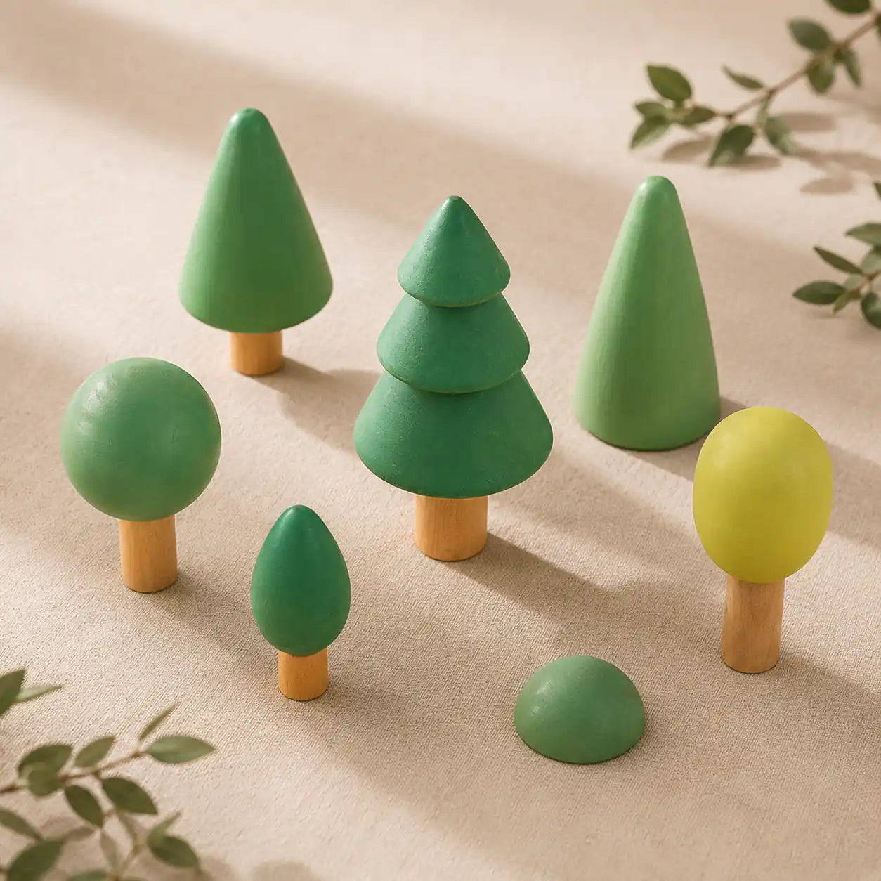 Wooden forest tree set styled in a warm nursery play scene