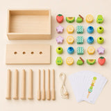 Wooden fruit bead set components laid flat with wooden box, dowels, lacing sticks, string, 25 fruit beads, and pattern cards
