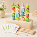 Wooden fruit bead stacking set with 4 standing dowels holding colorful fruit beads in a solid wood box base, pattern cards in the foreground