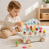 Pastel wooden ice cream cart pull-along toy styled in a calm Montessori playroom