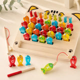Wooden magnetic alphabet fishing game with the word CAT spelled out during play