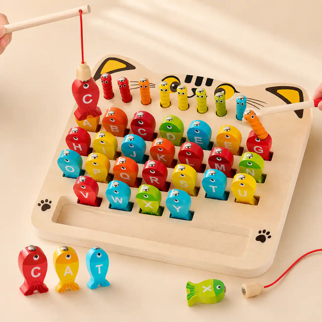 Both magnetic fishing rod and wand in use on the wooden alphabet fishing game