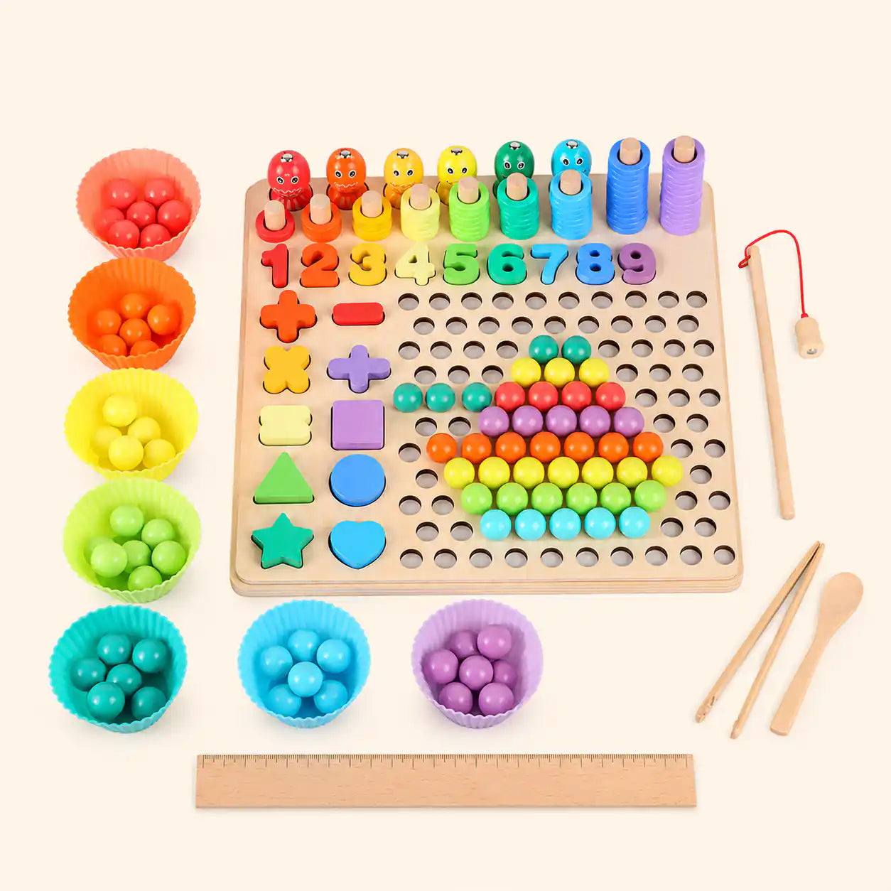 Clean top-down view of the complete wooden Montessori 10-in-1 learning board set with pegs, numbers, shapes, beads, sorting bowls, fishing rod, tweezers, spoon, and wooden ruler