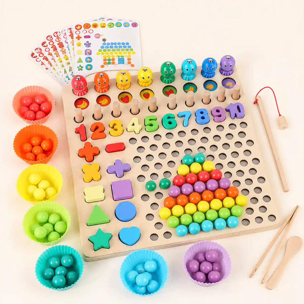 Top-down view of the wooden Montessori 10-in-1 learning board with stacked pattern cards, sorting bowls, all numbers, shapes, beads, fishing rod, and wooden tools