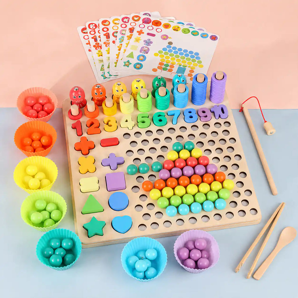 Wooden Montessori 10-in-1 learning board with sorting bowls, pattern cards, stacking number towers, wooden numbers, shapes, beads, fishing rod, and wooden tweezers on a pink and blue background