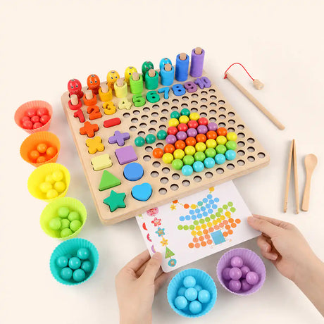 Hands holding a colorful pattern card next to the wooden Montessori 10-in-1 learning board with bead grid, numbers, and sorting bowls