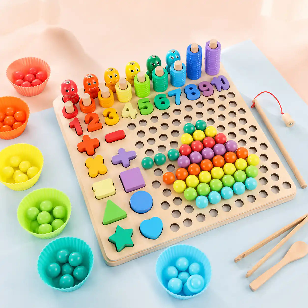 Side angle of the wooden Montessori 10-in-1 learning board showing counting tower pegs, numbers 1 to 10, shape pieces, math symbols, and a pyramid of colored wooden beads