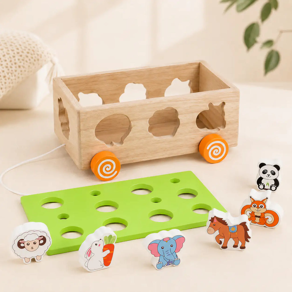 Wooden carrot harvest play with the Montessori harvest cart and felt-topped wooden carrots