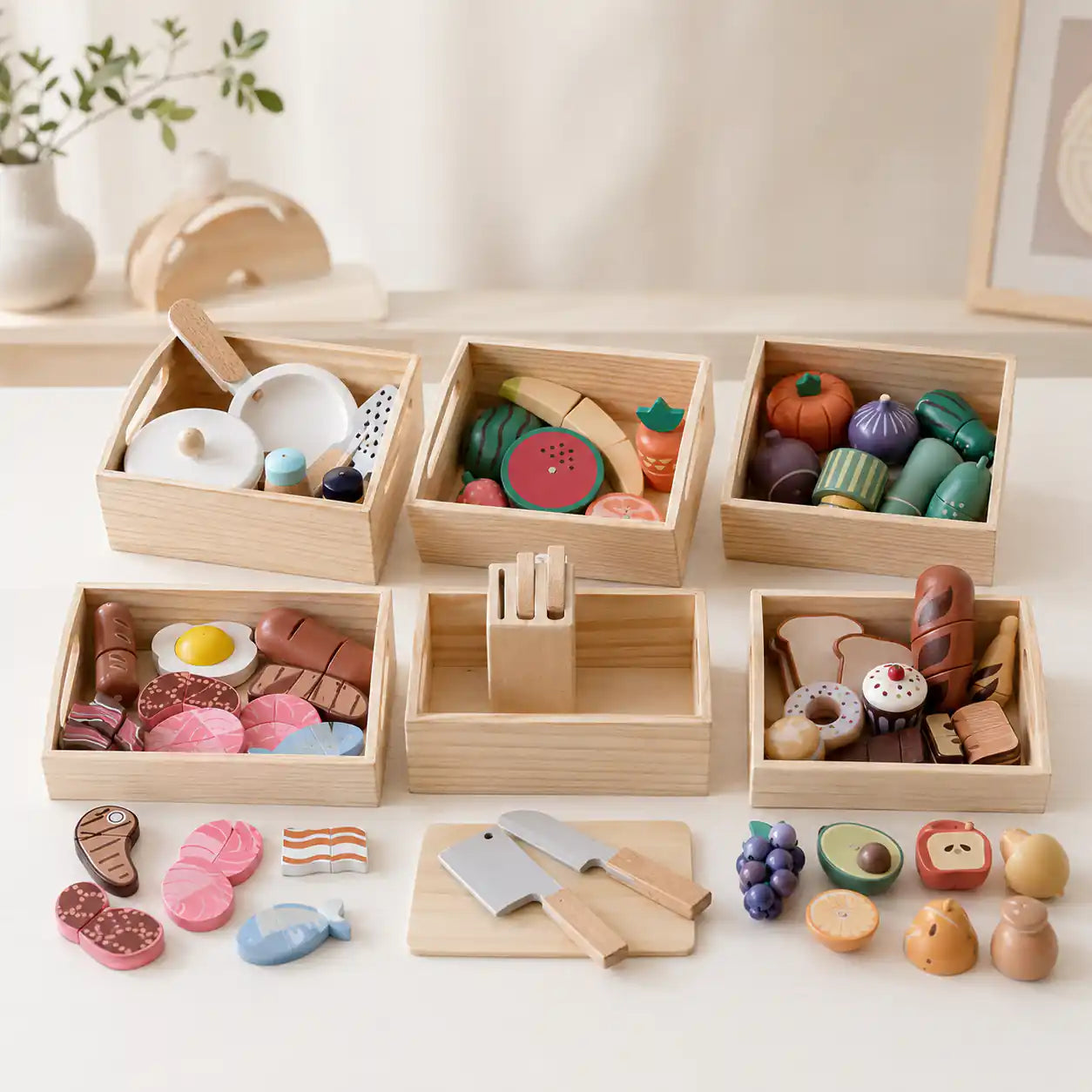 Wooden play food set hero shot with all five Montessori pretend kitchen sets