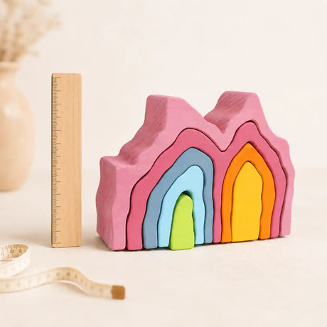 Close-up of a single wooden coral stacker piece showing painted finish and detail