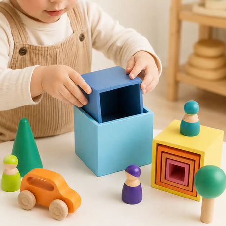 Wooden rainbow nesting cubes styled in a warm nursery play scene