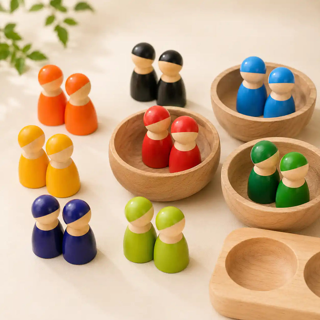 Side view of a single wooden rainbow peg doll showing rounded shape and painted finish