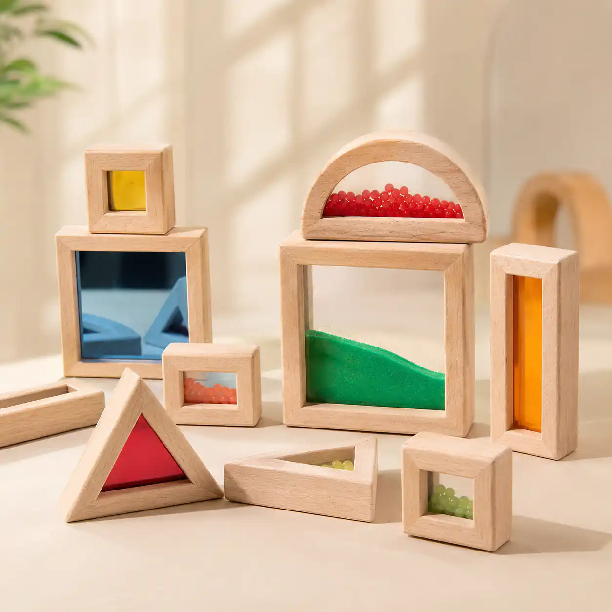 Toddler exploring the wooden sensory blocks in a calm Montessori playroom