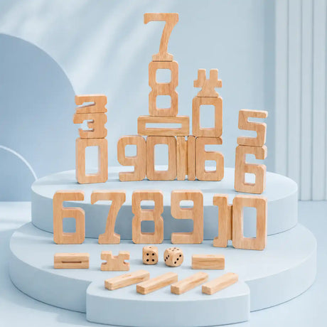 Dimensions diagram for wooden stacking number blocks showing the 1, 5, 6, and 10 pieces with proportional heights and the 2 cm dice