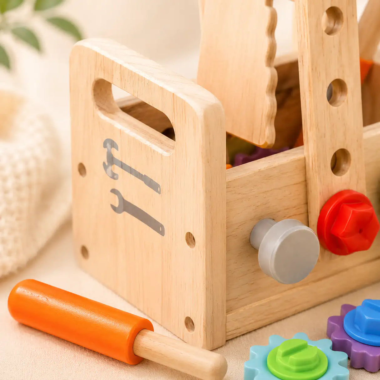 Wooden toddler tool box windmill build made from construction plates, nuts and bolts