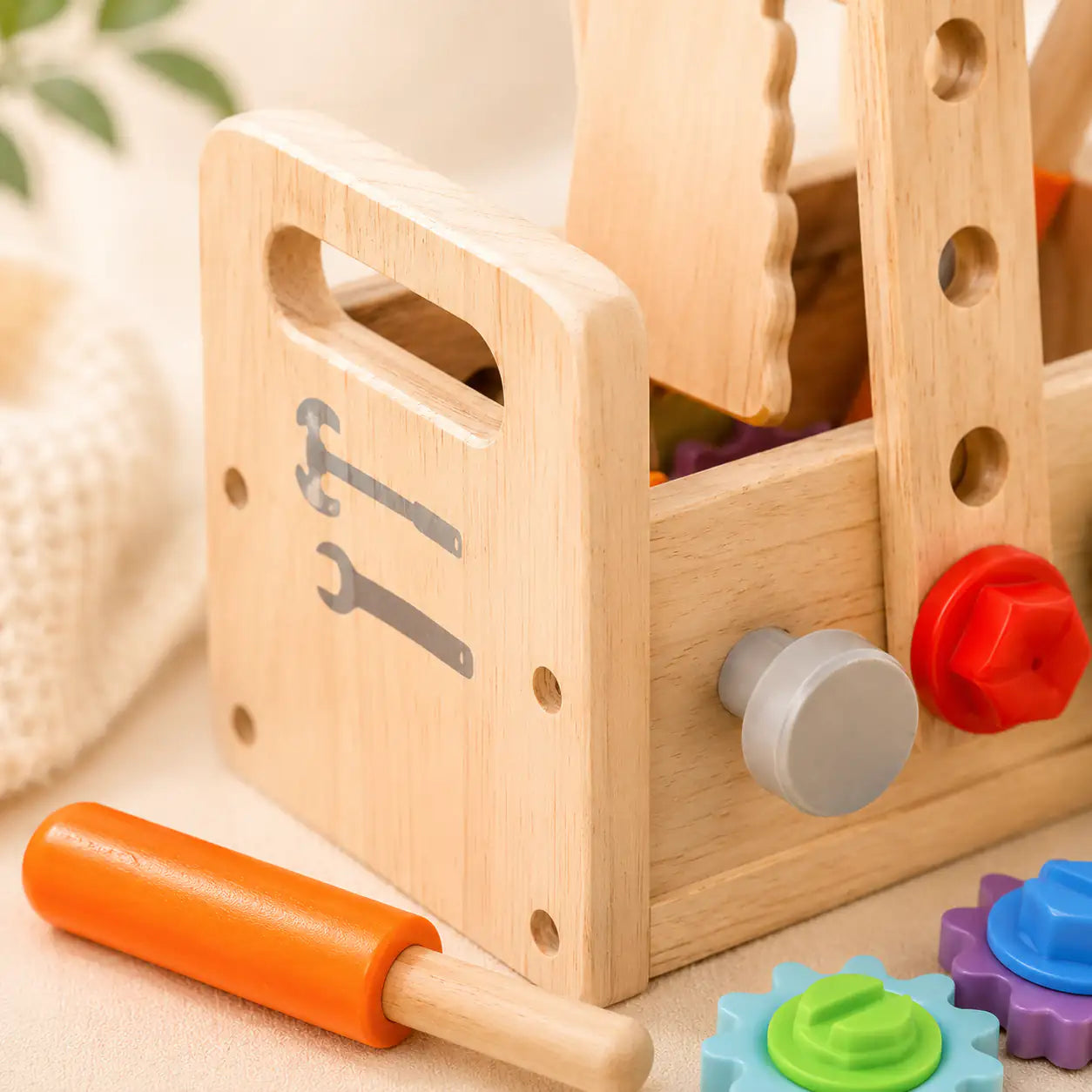 Wooden toddler tool box windmill build made from construction plates, nuts and bolts